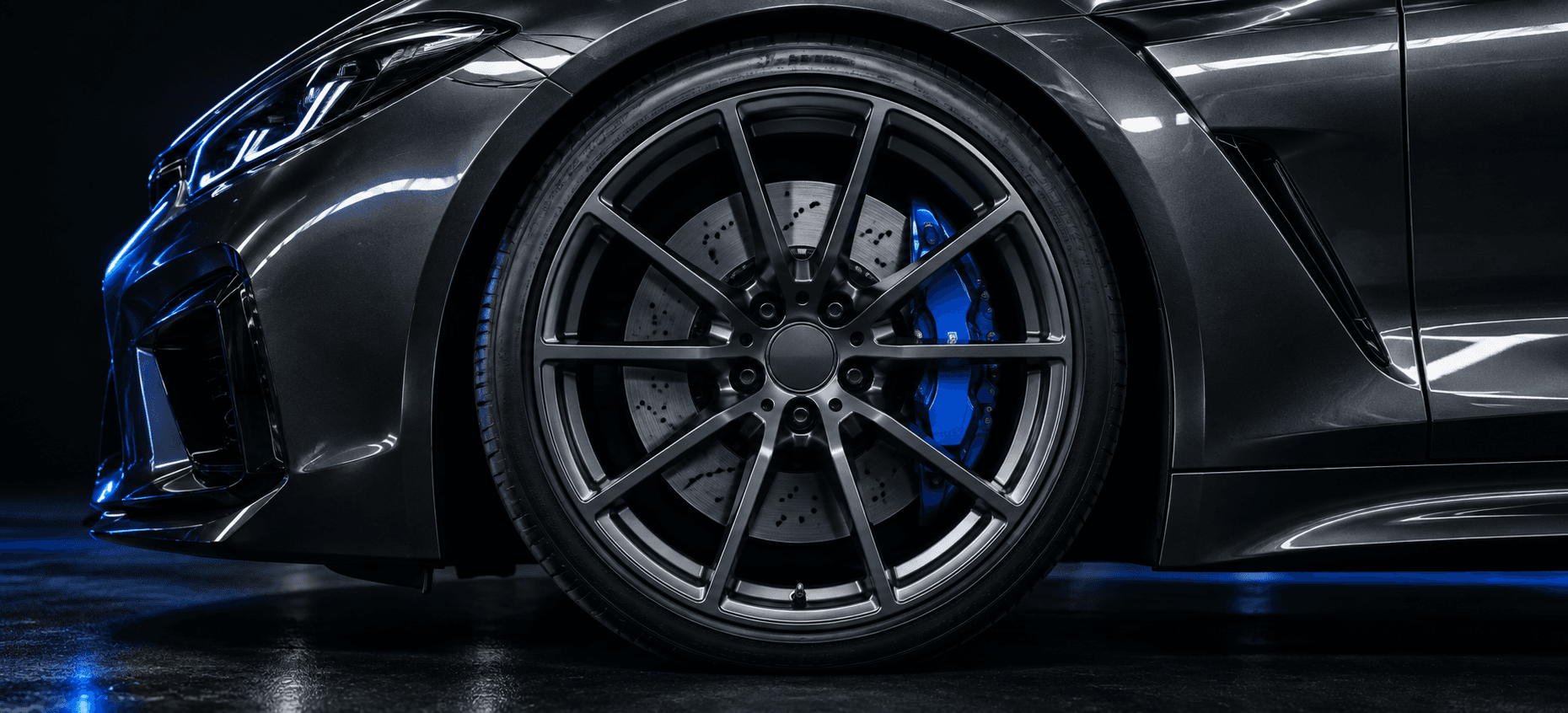 Polished alloy wheel under cobalt studio light